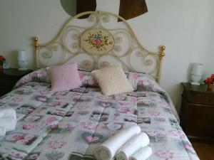 Postel nebo postele na pokoji v ubytování B&B Tisoi
