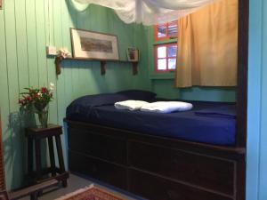 Postel nebo postele na pokoji v ubytování Creole house 2 bedrooms with garden Best View Rodney Bay 21