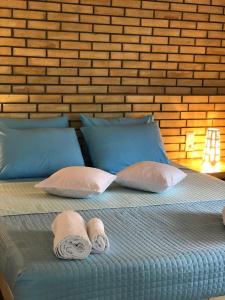 Postel nebo postele na pokoji v ubytování Tzavelitiko Home