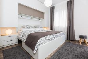 Posteľ alebo postele v izbe v ubytovaní Villa Pergola-Apartment Toni