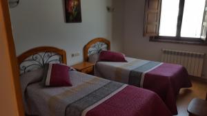 Cama o camas de una habitación en Hotel Restaurante La Parra