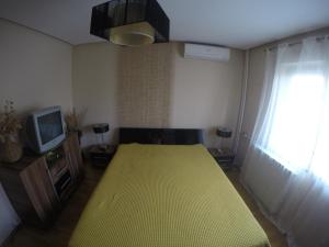 Llit o llits en una habitació de Apartment Central