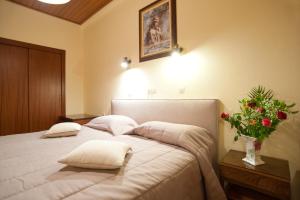 Hermes Delphi Hotel客房内的一张或多张床位