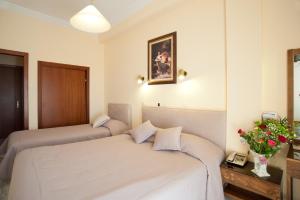 Hermes Delphi Hotel客房内的一张或多张床位