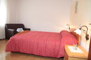 Albergo diffuso Valcellina e Val Vajont in Claut房間的床