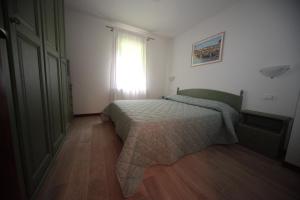 Albergo diffuso Valcellina e Val Vajont in Claut房間的床
