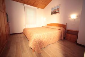 Albergo diffuso Valcellina e Val Vajont in Claut房間的床