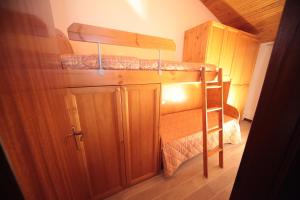 Albergo diffuso Valcellina e Val Vajont in Claut房間的床