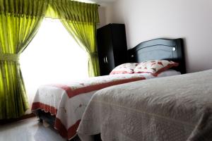Hotel LB - Los Balsos客房内的一张或多张床位