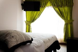 Hotel LB - Los Balsos客房内的一张或多张床位