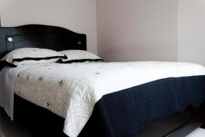 Hotel LB - Los Balsos客房内的一张或多张床位