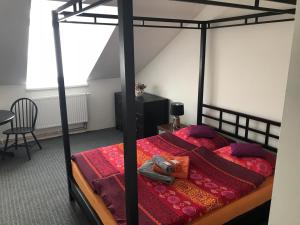 Ліжко або ліжка в номері Penzion u Antonicka