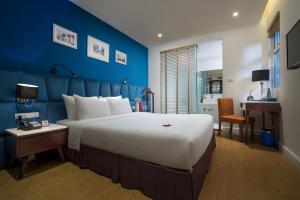 Postel nebo postele na pokoji v ubytování Hanoi Brilliant Hotel & Spa