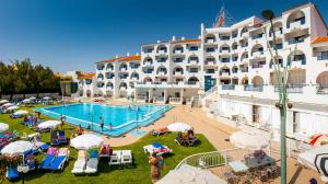 a view of a hotel with a swimming pool at Tropical Sol in Albufeira