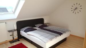Säng eller sängar i ett rum på Wolke Siegen