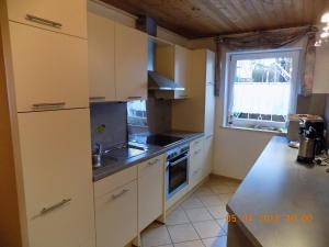 Kuchyň nebo kuchyňský kout v ubytování Haus Alexandra