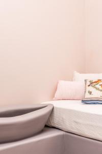 Voodi või voodid majutusasutuse Ios Resort toas
