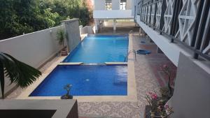 Utsikt mot bassenget på Luxor appartement eller i nærheten