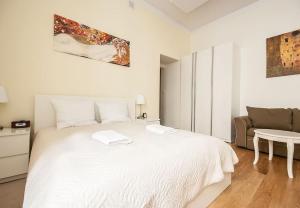 Posteľ alebo postele v izbe v ubytovaní Elegant Apartment Foksal