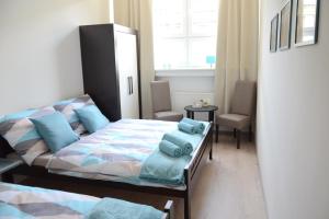 Postel nebo postele na pokoji v ubytování Hostel Bratislava