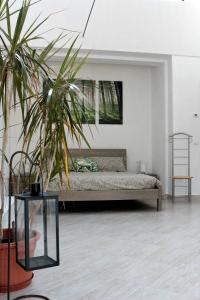Postel nebo postele na pokoji v ubytování Paradeisos Residence Sas