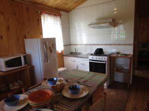 Cucina o angolo cottura di Cabañas Antilhue