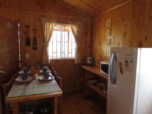 Cucina o angolo cottura di Cabañas Antilhue