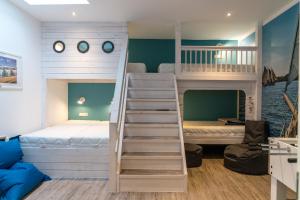 a bunk bed in a room with a bunk bed at Beachhouse in Cuxhaven