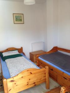 เตียงในห้องที่ Dom nad morzem - Wiosłowa