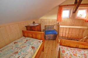Letto o letti in una camera di Lärchenhütte