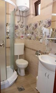 Vannituba majutusasutuses Garni Hotel Laguna Lux