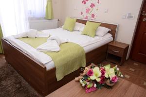 Кровать или кровати в номере Garni Hotel Laguna Lux