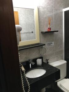 Ein Badezimmer in der Unterkunft Ocio Apart