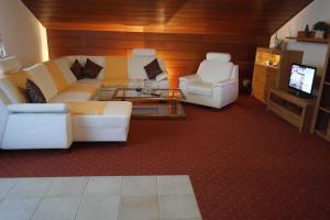 A seating area at Landhotel Windlicht