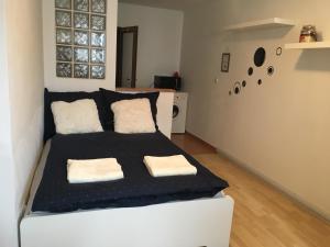 Posteľ alebo postele v izbe v ubytovaní Sausage dog's apartments