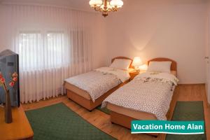 Кровать или кровати в номере Vacation home Alan