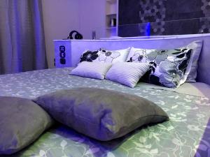 Postel nebo postele na pokoji v ubytování Assisi Luxury SPA Suite