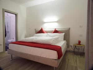 Postel nebo postele na pokoji v ubytování B&B Perbacco Relax