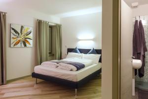 Postel nebo postele na pokoji v ubytování B&B Perbacco Relax