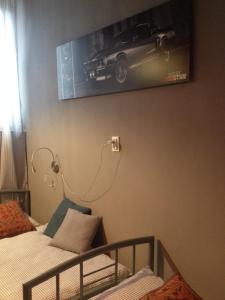 Ein Bett oder Betten in einem Zimmer der Unterkunft Ipoly Party-Ház