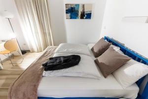 Postel nebo postele na pokoji v ubytování B&B Perbacco Relax
