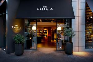 
a store front with a large window at Hotel Villa Emilia in Barcelona

