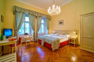 Posteľ alebo postele v izbe v ubytovaní Josephine Old Town Square Hotel - Czech Leading Hotels