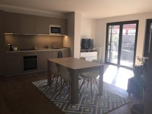 Kuchyňa alebo kuchynka v ubytovaní APARTAMENTO CÉNTRICO EN OLOT