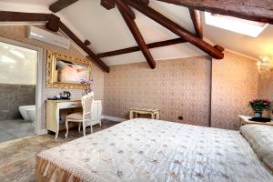 Postel nebo postele na pokoji v ubytování New Reiter Hotel