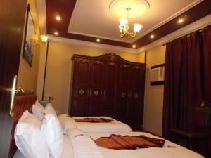 Postel nebo postele na pokoji v ubytování Hotel Berg Rappeg