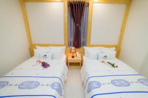 Postel nebo postele na pokoji v ubytování Starhill Hotel