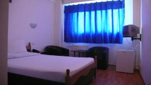 Voodi või voodid majutusasutuse Hotel Uranus toas