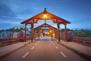 a bridge with a lit up canopy on a road at Apartment at Ranheim in Trondheim