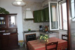 Kuchyň nebo kuchyňský kout v ubytování Carrube House + 20 fotografií